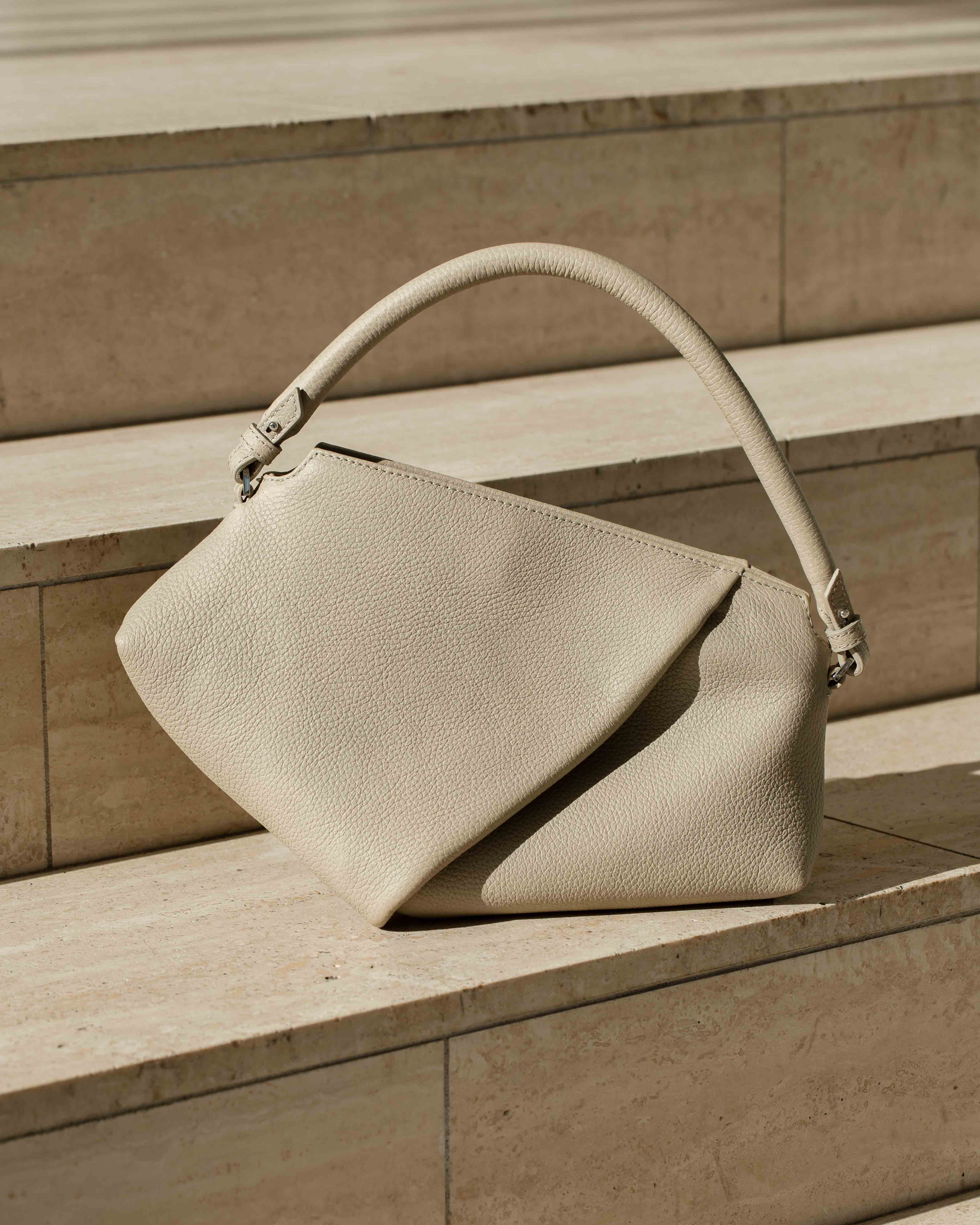Kajo crossbody-laukku dark ivory